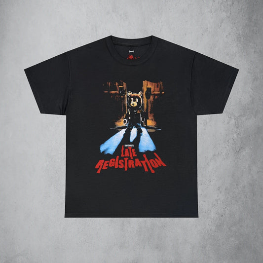 Panoramic View of Graphic t-shirt featuring a stylized bear mascot in a spotlight, representing Kanye West's 'Late Registration' album, with bold red text.