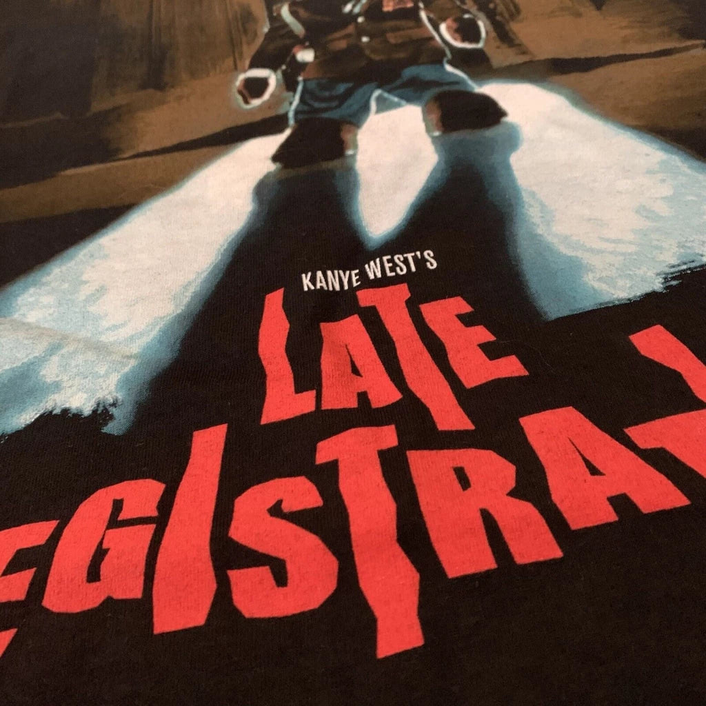 Close up Graphic t-shirt featuring a stylized bear mascot in a spotlight, representing Kanye West's 'Late Registration' album, with bold red text.