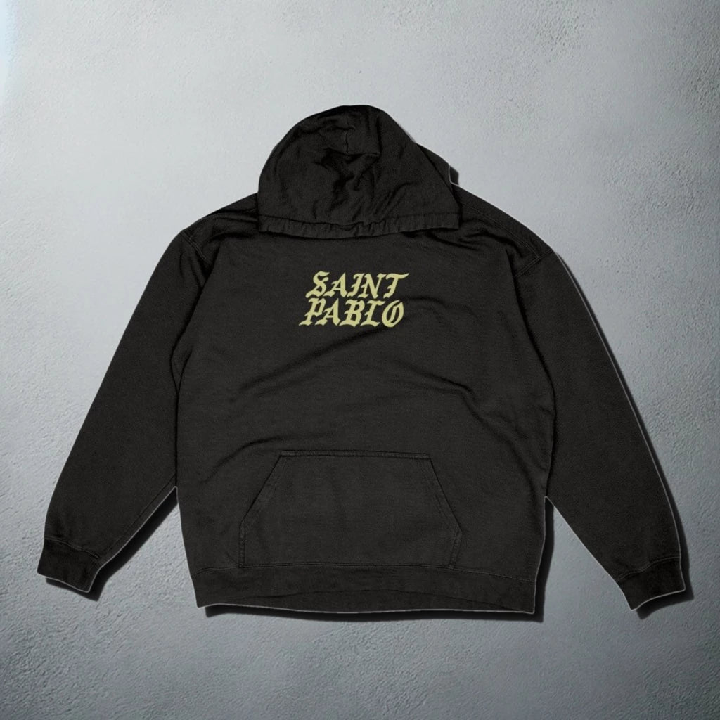 Black 'Saint Pablo' tour hoodie with a bold yellow text on the front, for Kanye merchandise