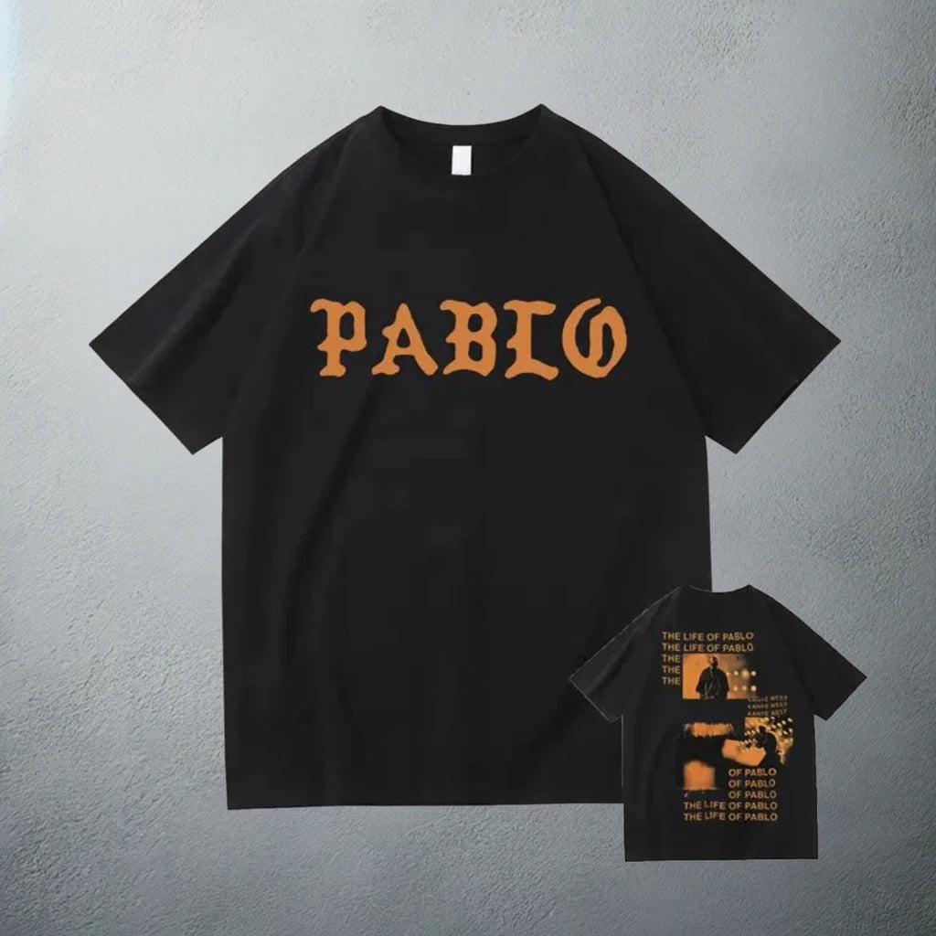 Black 'PABLO' T-shirt with orange lettering and 'The Life of Pablo' album artwork on the back, inspired by Kanye West's music