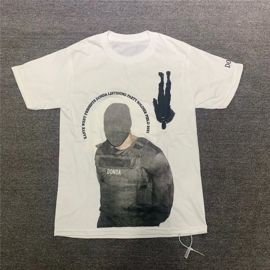 White t-shirt with 'Donda' album cover print and black ink splash, commemorating Kanye West's listening party event 2021