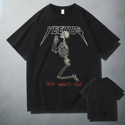 Black 'Yeezus' T-shirt with a white praying skeleton graphic and 'God Wants You' text, showcasing a bold design inspired by Kanye West's album